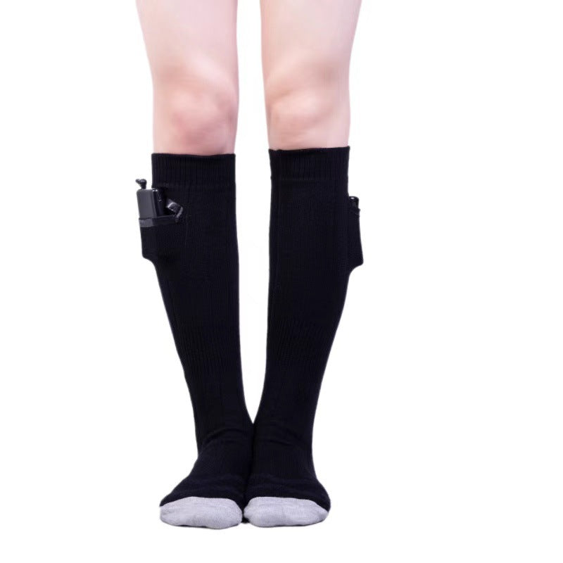 Chaussettes chauffantes pour rester au chaud en hiver, chaussettes électriques rechargeables par USB, montantes, résistantes au froid pour hommes et femmes, pour des pieds bien au chaud en hiver.