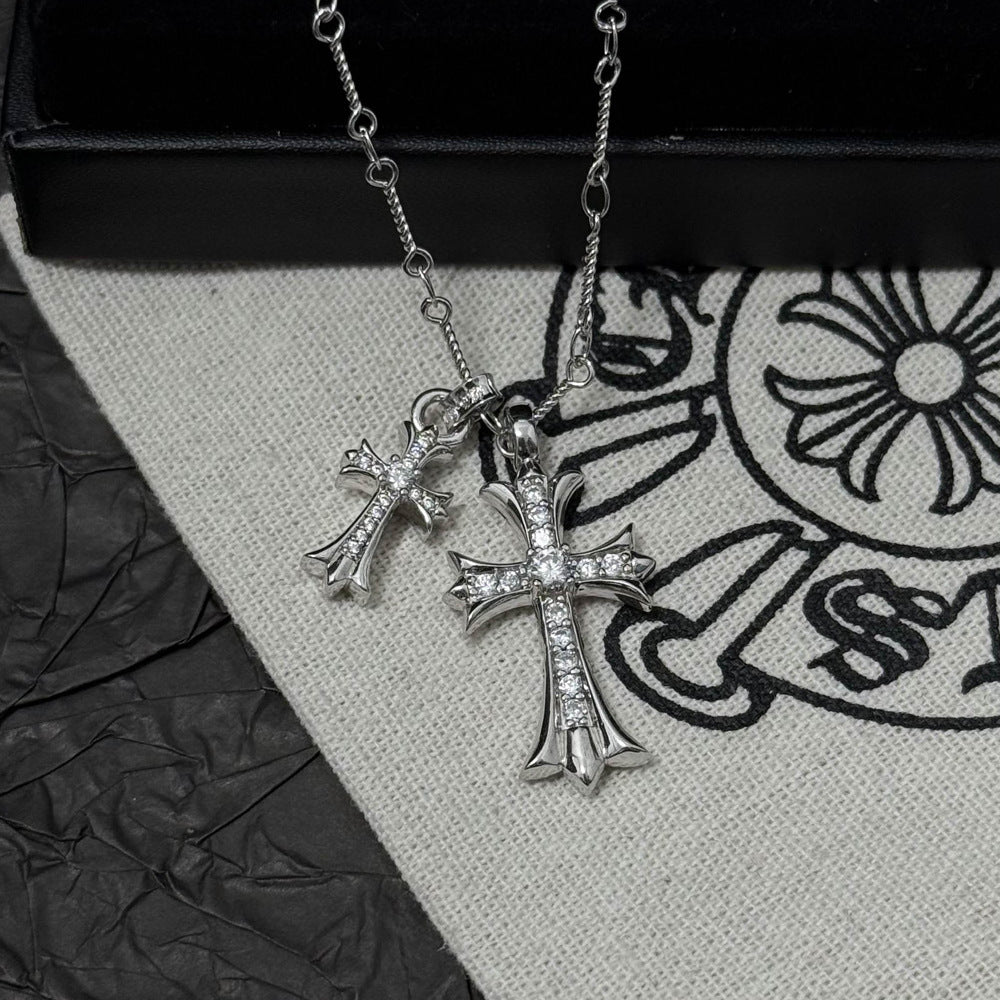 Vintage colored diamond double cross pendant necklace