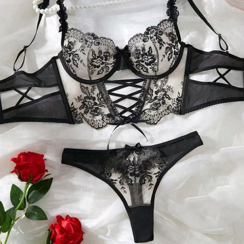 Conjunto de lencería sexy de malla con bordado floral y lazo cruzado para mujer