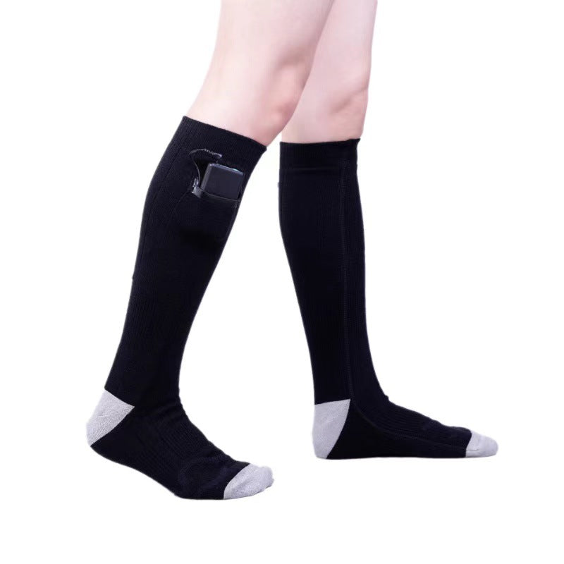 Chaussettes chauffantes pour rester au chaud en hiver, chaussettes électriques rechargeables par USB, montantes, résistantes au froid pour hommes et femmes, pour des pieds bien au chaud en hiver.