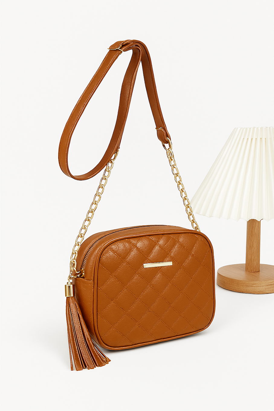 Elegant Black Quilted Bag with Gold Chain Tassel